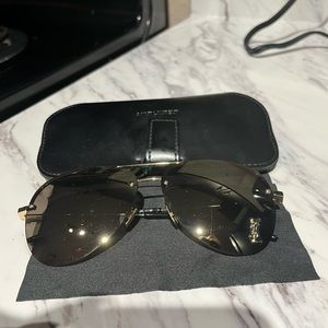 Yves Saint Laurent aviator sunglasses.